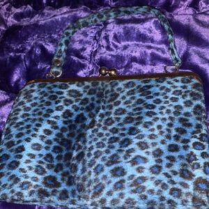 Blue cheetah print handbag